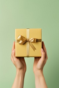 Hand holding gift box adult anniversary celebration. AI generated Image by rawpixel.