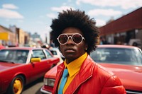 Black young man in a solid color vibrant jacket car photography sunglasses. AI generated Image by rawpixel.
