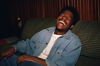 Black man laughing adult relaxation. AI generated Image by rawpixel.