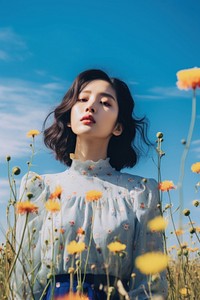 East Asian women beautiful flowers in a field portrait summer plant. AI generated Image by rawpixel.