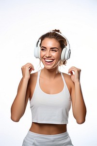 A Beautiful woman wearing gym clothes and headphones dancing happily and cheerful listening headset smiling. AI generated Image by rawpixel.