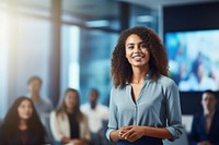 A woman presenting company profile on TV screen in the meeting room office smile adult. AI generated Image by rawpixel.
