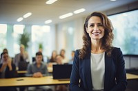 A woman presenting company profile on TV screen in the meeting room office adult smile. 