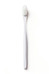 A toothbrush tool white background silverware. AI generated Image by rawpixel.