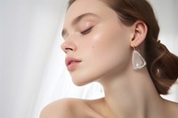 Earring jewellery on woman ear jewelry luxury adult. AI generated Image by rawpixel.