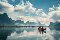 Couple rowing canue landscape outdoors vehicle. AI generated Image by rawpixel.