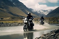 Motorbike riding through shallow river motorcycle adventure mountain. AI generated Image by rawpixel.