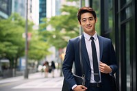 Japanese businessman building smiling blazer. AI generated Image by rawpixel.