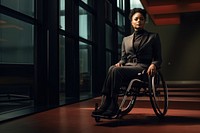 Presenting sitting wheel adult. AI generated Image by rawpixel.