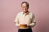 Senior taiwanese man cake birthday dessert. AI generated Image by rawpixel.