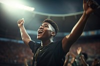 Black teen male cheering football game in stadium sports adult achievement. AI generated Image by rawpixel.