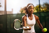 Black woman enjoy playing tennis in tennis court sports racket adult. AI generated Image by rawpixel.