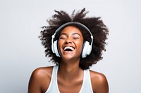 African american woman delight enjoy music headphones laughing headset. AI generated Image by rawpixel.