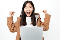 Excited young asian girl with laptop computer adult white background. AI generated Image by rawpixel.