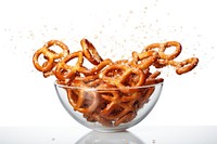 Salted pretzels in bowl food white background freshness. 