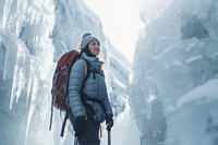Mature woman on adventure trail in ice backpack outdoors nature. AI generated Image by rawpixel.