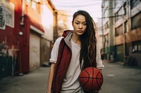 Asian American female basketball player sports city architecture. AI generated Image by rawpixel.