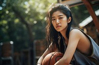 Asian female basketball player sports contemplation accessories. AI generated Image by rawpixel.