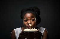 Black South African woman cake birthday dessert. AI generated Image by rawpixel.