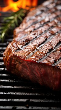 Grilled steak grilling cooking meat. AI generated Image by rawpixel.
