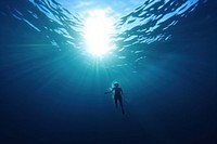 Young woman swimming underwater adventure outdoors. AI generated Image by rawpixel.