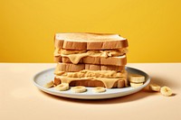 Sandwich with peanut butter and slice of bananas on top bread food breakfast. AI generated Image by rawpixel.