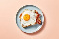 Toast with fried egg and bacon on top table food meat. AI generated Image by rawpixel.