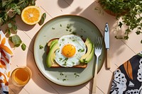 Toast with fried egg and Avocado on top fruit plate table. AI generated Image by rawpixel.