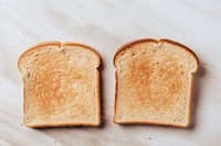 Whole wheat toasted bread table food breakfast. AI generated Image by rawpixel.