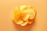 Potato chip orange background freshness blossom. AI generated Image by rawpixel.