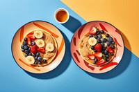 Two plates containing fruit and pancake with nut butter blueberry breakfast plant. AI generated Image by rawpixel.