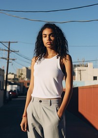 Black young woman wearing a white tank top with basketball standing adult sky. AI generated Image by rawpixel.