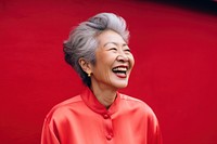 Chinese grandmother laughing outdoors smiling. AI generated Image by rawpixel.