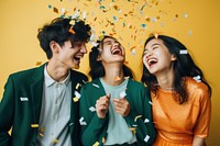 3 east asian people talking at each other celebration celebrating laughing. AI generated Image by rawpixel.