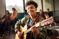 A Latinx boy high school student playing guitar musician adolescence performance. AI generated Image by rawpixel.