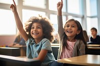 2 Latinx elementary school students classroom child togetherness. AI generated Image by rawpixel.