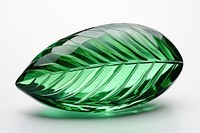 Green leaf gemstone jewelry emerald. AI generated Image by rawpixel.