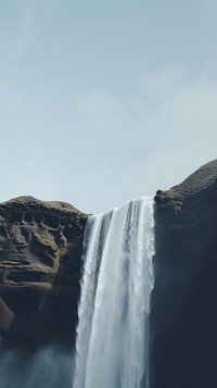Waterfall outdoors nature sky. AI generated Image by rawpixel.