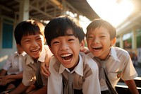 Southeast Asian students laughing school child. AI generated Image by rawpixel.