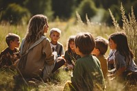 Children with teacher nature outdoors field. 