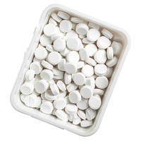 White cirlce pills in plastic box white background medication container. AI generated Image by rawpixel.