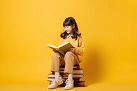 Asian girl reading book sitting cross-legged publication. AI generated Image by rawpixel.