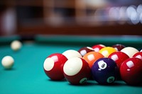 Closeup of billiard balls and sticks on the table billiards sports eight-ball. 