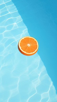 Orange floating in a pool grapefruit plant refreshment. AI generated Image by rawpixel.