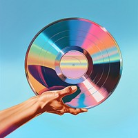 Hand holding a Vinyl record with a blank label isolated on clear solid background technology turntable spinning. AI generated Image by rawpixel.