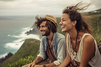 Two Latin Brazilian tourists sitting happily on a hill laughing travel adult. AI generated Image by rawpixel.