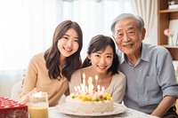 Japanese Asian family grandfather birthday dessert. AI generated Image by rawpixel.