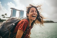 Female backpacker laughing travel nature. AI generated Image by rawpixel.