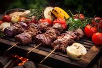 Assorted delicious grilled meats and vegetables on barbecue on rustic wooden planks grilling cooking plant. AI generated Image by rawpixel.