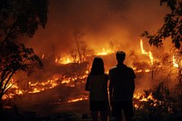 View of people looking forest fires night adult togetherness. AI generated Image by rawpixel.